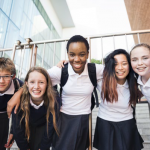 Group of kids at school - Perennial support for families